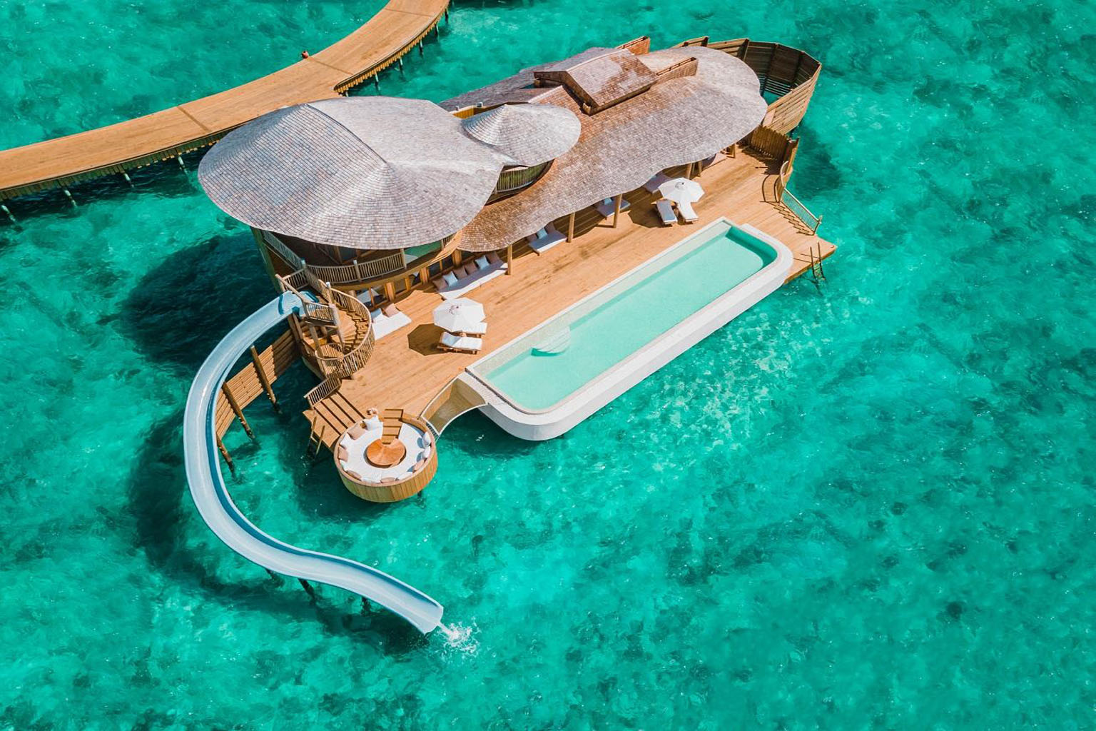 Luxury Maldives overwater bungalow comparison 2026 resort guide Soneva Jani cost