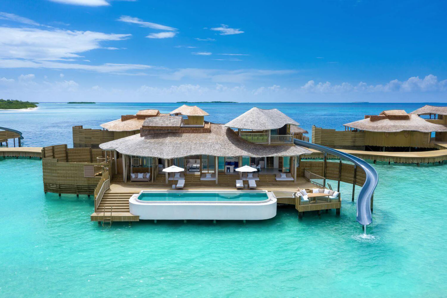 Overwater villas in Maldives tour package from Bangalore with turquoise lagoon