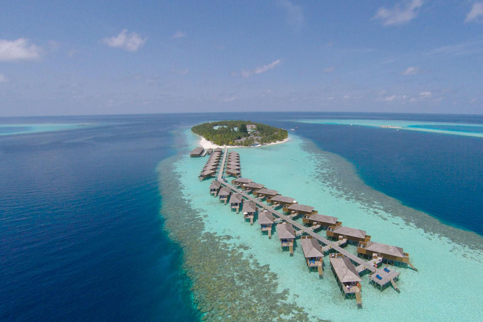 Family enjoying beach in Maldives – budget family package from Chennai